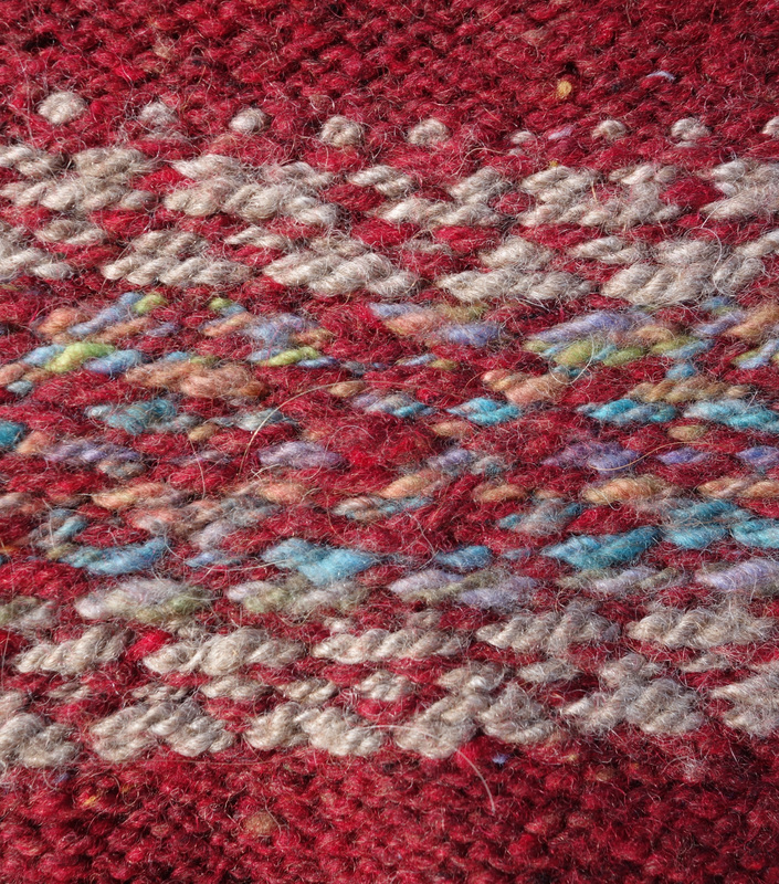 Reverse of colour work section using handspun and commercial yarn