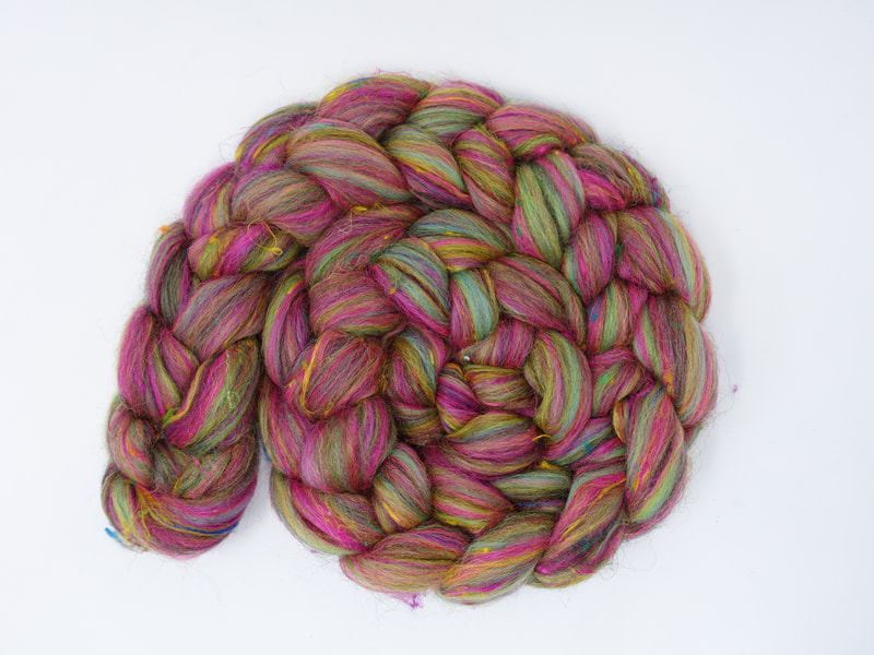 A braid of fibre with streaks of Pink, Lime and Aqua