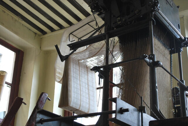 Jacquard loom with its punchcards in weaver's loft