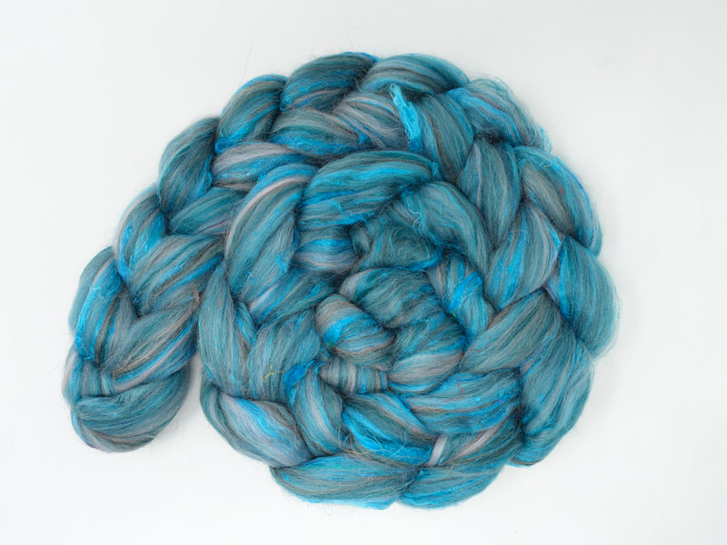 Turquoise fibre with grey streaks
