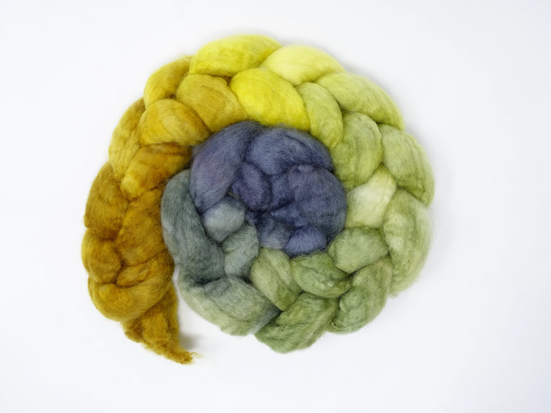 Spiral of braided fibre. Colour transition- grey, green, lemon, mustard
