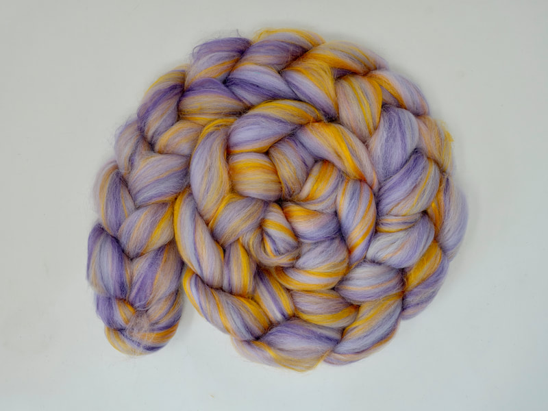 Lilac and pink combed top with streaks of saffron gold bamboo