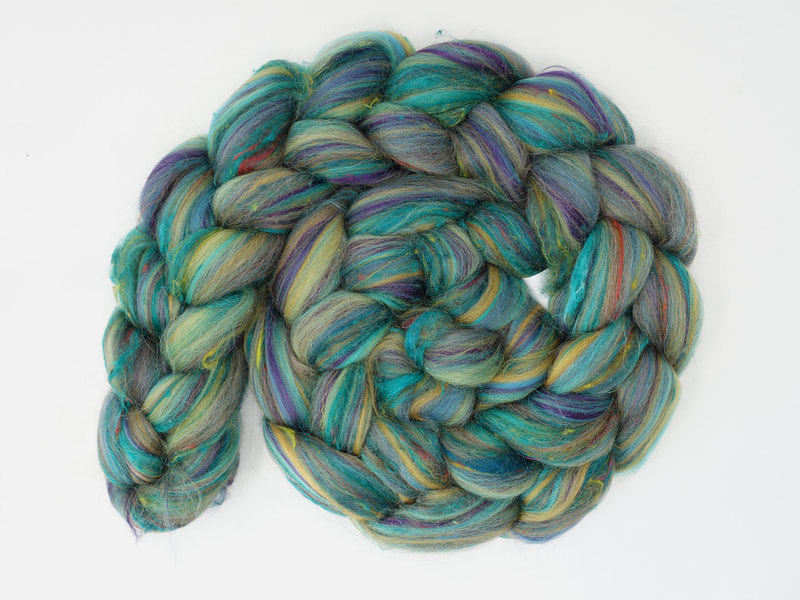 Jade Green fibre with streaks of mustard and blue