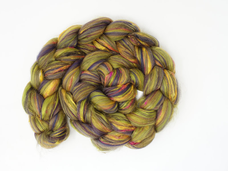 Khaki green fibre with streaks of yellow and dark purple